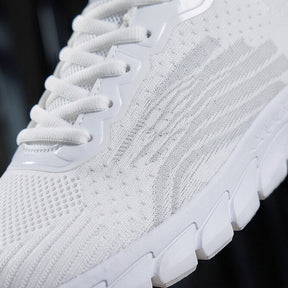 Strider — Athletic Mesh Sneaker with Segmented Sole