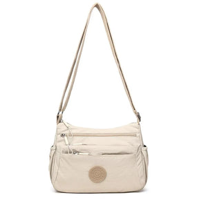 PocketPro – Multi-Compartment Crossbody Bag