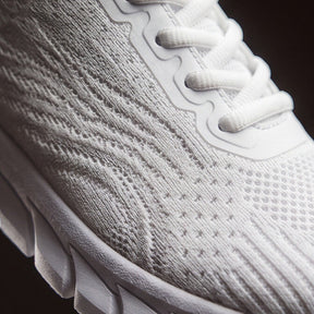 Strider — Athletic Mesh Sneaker with Segmented Sole