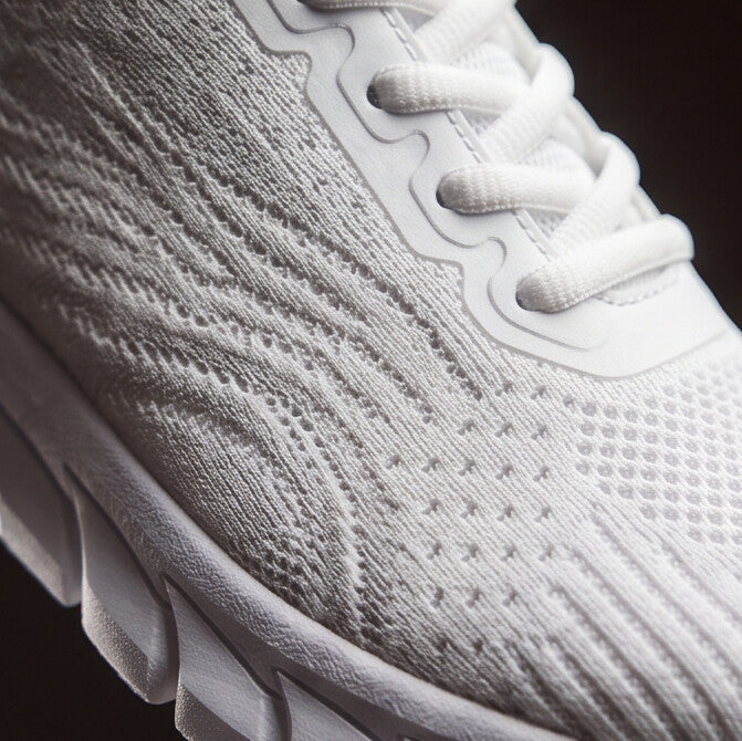 Strider — Athletic Mesh Sneaker with Segmented Sole