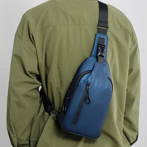 SyncPack™ – Waterproof Crossbody Bag with USB Port