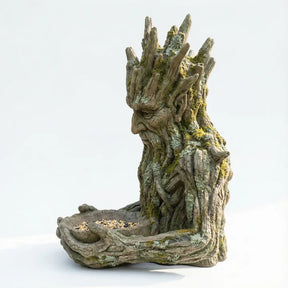 The Quiet Offering A Tree-Integrated Bird Feeding Sculpture