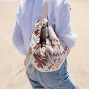 CoastCarry – Sand-Resistant Towel Backpack for Beach Days