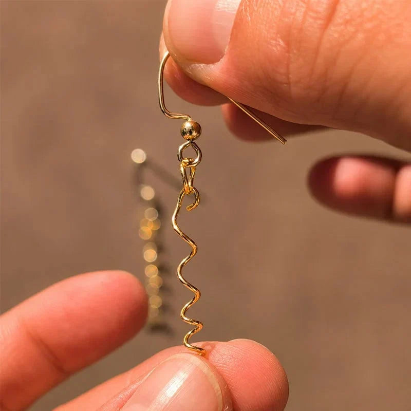 BloomTwist – Artistic Spiral Statement Earrings