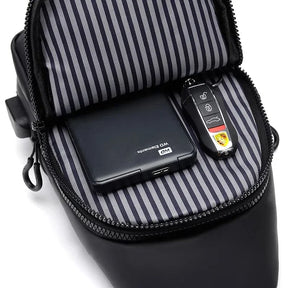 SyncPack™ – Waterproof Crossbody Bag with USB Port