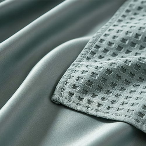 CloudWeave – Breathable Luxury Waffle Blanket